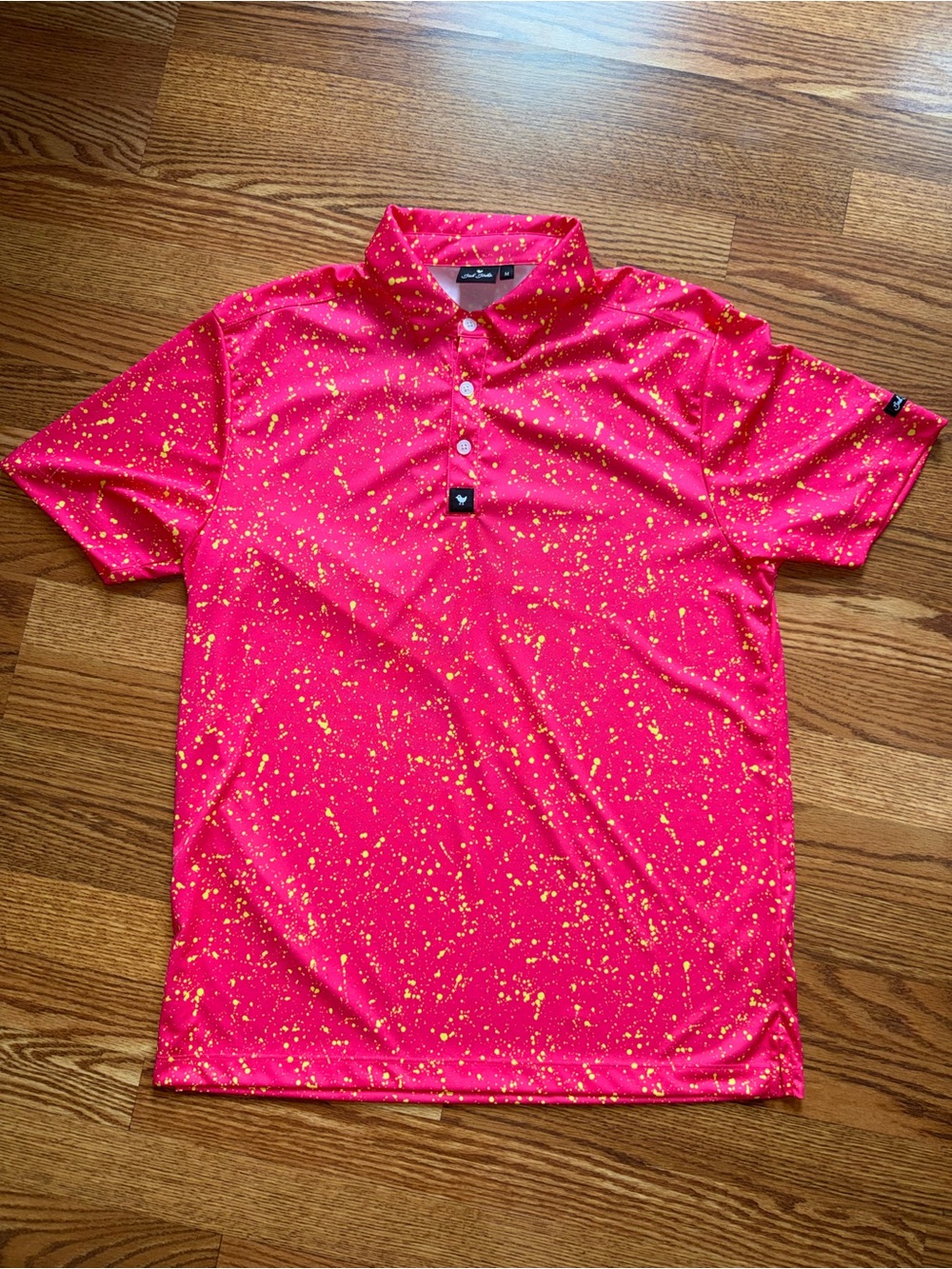 Bad Birdie Neon Pink Golf Polo with Yellow Paint-Splatter Print Medium